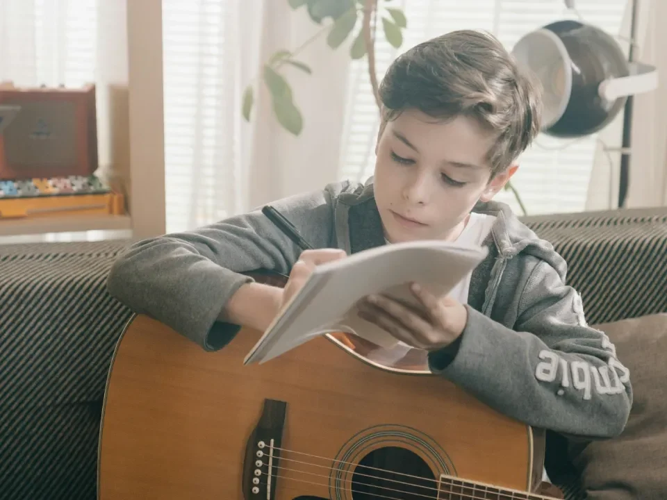 Picture of boy songwriting