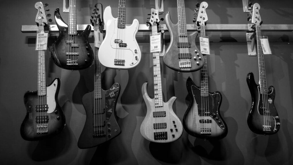 Photo of Guitars hung on a wall