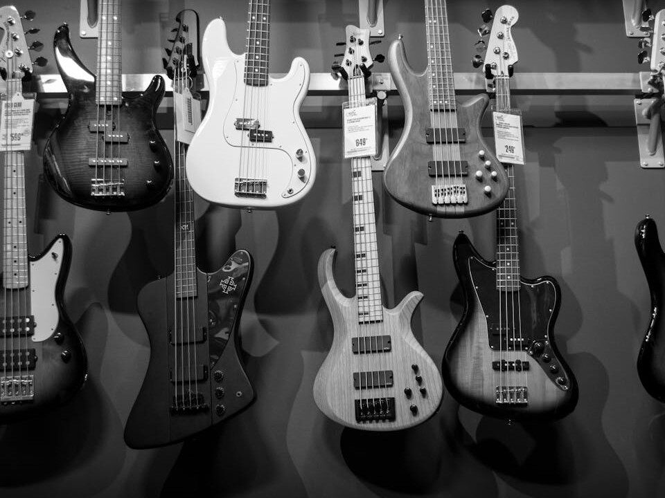 Photo of Guitars hung on a wall