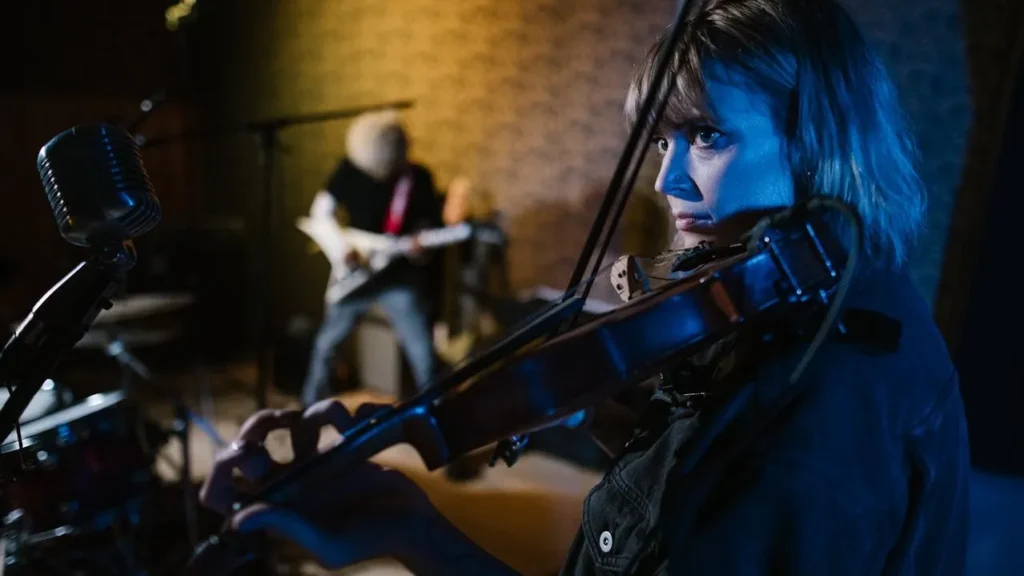 Image of violinist looking serious during practice